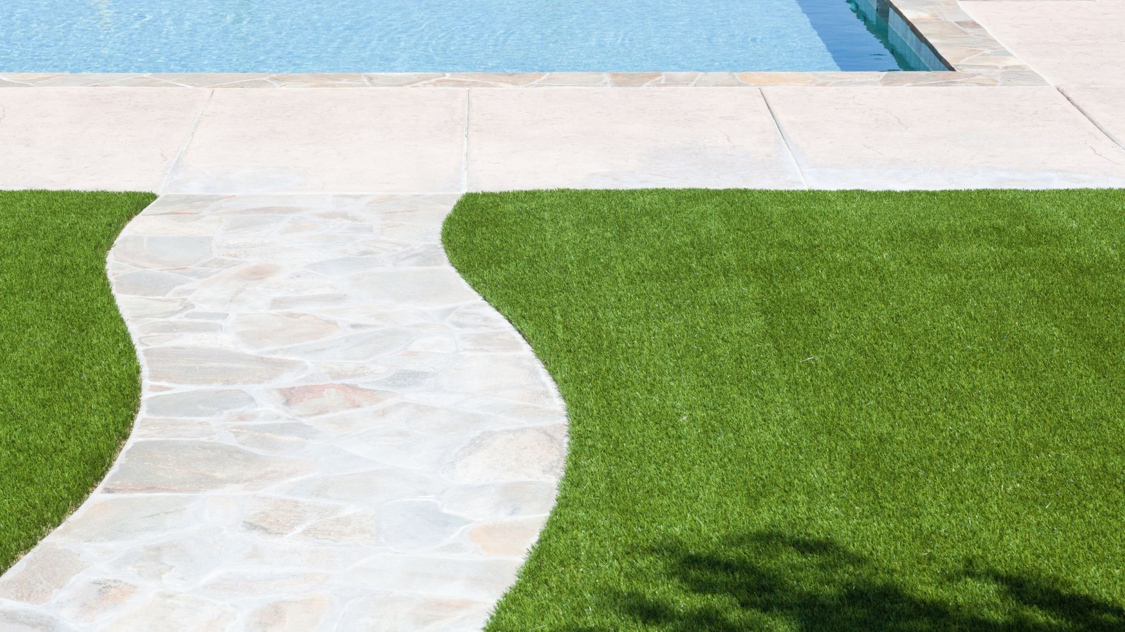 Artificial Turf Grass Near a Pool